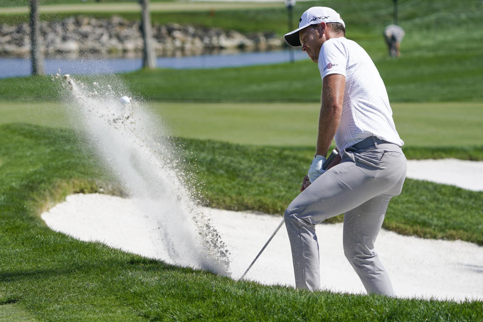 Danny Willett, of England, hits a shot from a sand trap on the 14th hole during the second round of the Arnold Palmer Invitational golf tournament Friday, March 4, 2022, in Orlando, Fla. (AP Photo/John Raoux)