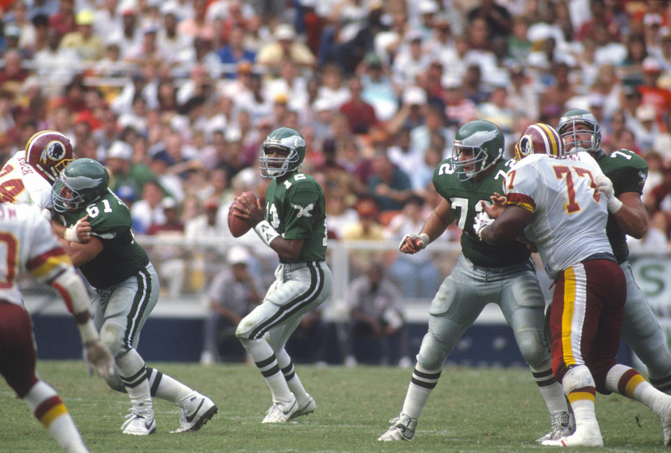 Randall Cunningham of the Philadelphia Eagles drops back to pass on September 17, 1989, at RFK Stadium in Washington D.C. (Focus on Sport/Getty Images)