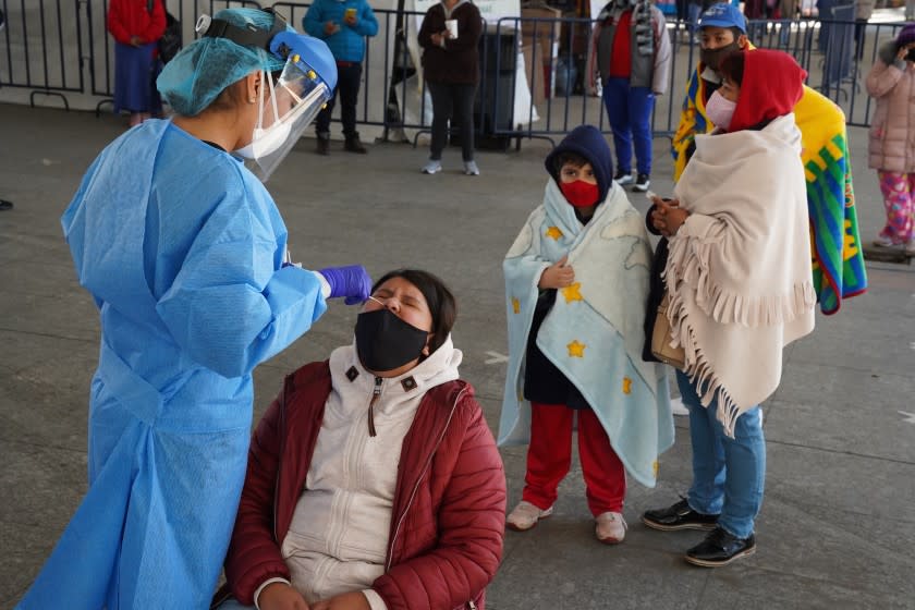 Families line up last week for Covid-19 tests at a testing center in Mexico City's Iztapalapa district.