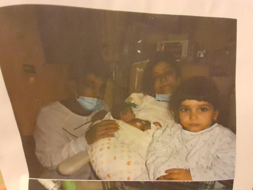 <p>Hajar and Rupak Sharif (left and middle) lost their third child, Aleksandra, after they were prevented from accessing urgent medical care by French police</p> (Hajar Sharif)