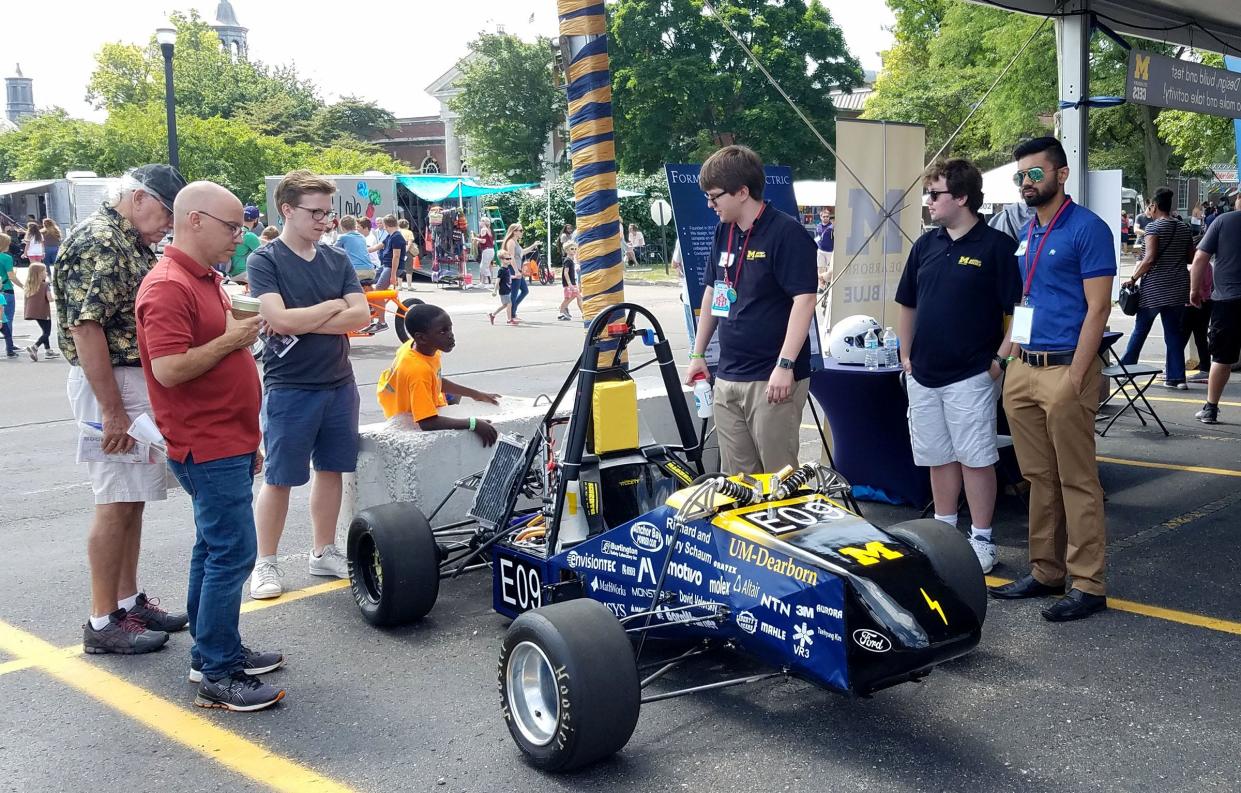 An electric car designed by University of Michigan Dearborn students was among the attractions at a previous Maker Faire Detroit.