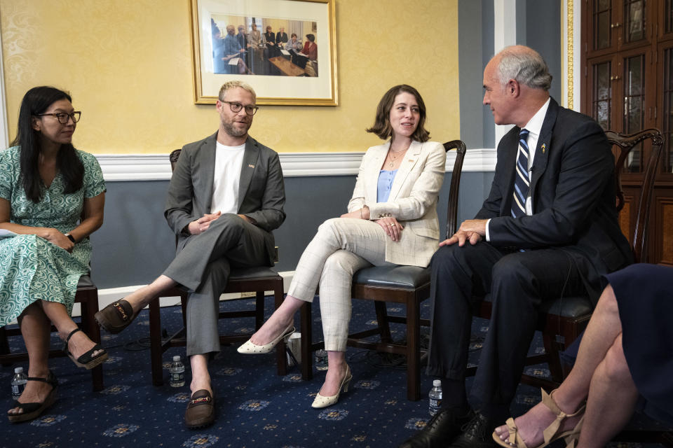 WASHINGTON, DC - SEPTEMBER 14: (L-R) National Domestic Workers Alliance president Ai-Jen Poo, actor Seth Rogen and Lauren Miller Rogen meet with Sen. Bob Casey (D-PA) on Capitol Hill September 14, 2022 in Washington, DC. The discussion focused on investments in home care for seniors and people with disabilities. (Photo by Drew Angerer/Getty Images)