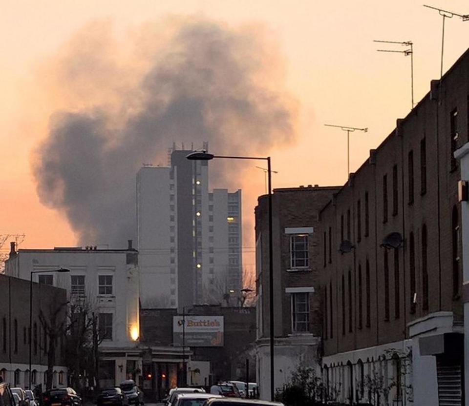 Thick smoke: Clouds billowed over north London streets