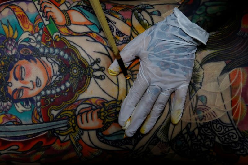 The Wider Image: Breaking taboos: Japan's tattoo fans bare their ink