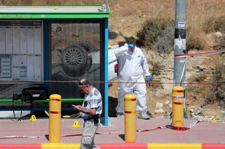 A car is seen at the scene of what Israeli military said is a car-ramming attack near the settlement of Elazar in the Israeli-occupied West Bank