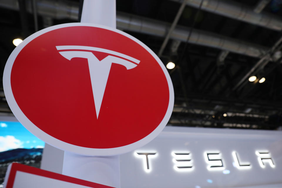 BEIJING, CHINA - AUGUST 29: A Tesla logo is displayed at Tesla booth ahead of the 2022 China International Fair for Trade in Services (CIFTIS) at China National Convention Center on August 29, 2022 in Beijing, China. The 2022 CIFTIS is slated to be held in Beijing from August 31 to September 5 to provide platforms for exchanges in service trade. (Photo by VCG/VCG via Getty Images)