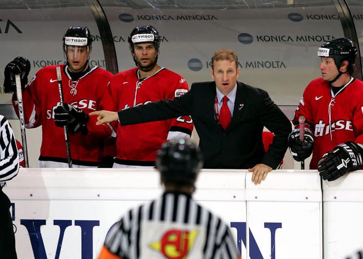 INNSBRUCK, AUSTRIA - MAY 12: Head coach Ralph Krueger of Switzerland talks to the referee during the game against Sweden in the IIHF World Men's Championships quarterfinal game at the Olympic Hall on May 12, 2005 in Innsbruck, Austria. (Photo by Bruce Bennett/Getty Images)