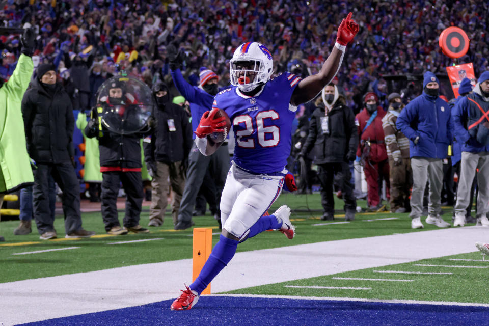 Devin Singletary of the Buffalo Bills celebrate as he scores a touchdown against the New England Patriots. (Photo by Timothy T Ludwig/Getty Images)