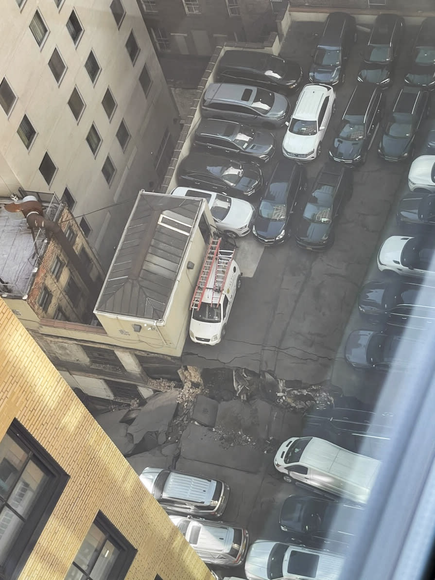 This photo provided by Charlie Franklin shows a partially collapsed parking garage in lower Manhattan's Financial District on Tuesday, April 18, 2023, in New York City. Officials didn't immediately release any information on injuries. (Charlie Franklin via AP)