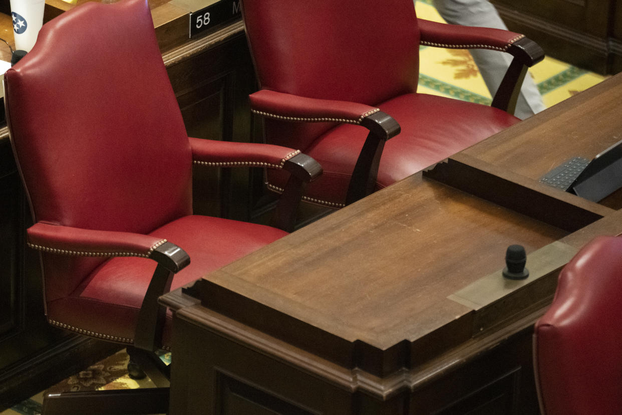 The seat of Rep. Scotty Campbell's, R-Mountain City, sits empty on the floor of the House chamber, Thursday, April 20, 2023 in Nashville, Tenn. Campbell resigned Thursday due to an ethics violation involving the Legislature's workplace discrimination and harassment policy. (AP Photo/George Walker IV)