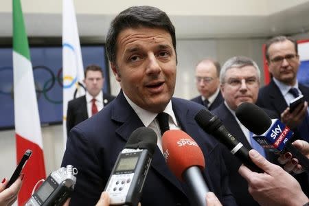 Italian Prime Minister Matteo Renzi speaks to media during a visit to the International Olympic Committee (IOC) headquarters in Lausanne, Switzerland, January 21, 2016. REUTERS/Pierre Albouy