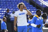 Los Angeles Chargers quarterback Justin Herbert looks on during pre-game warm-ups before an NFL football game against the Baltimore Ravens, Sunday, Oct. 17, 2021, in Baltimore, Md. (AP Photo/Terrance Williams)