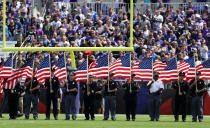 <p>First Responders carry flags prior to the Buffalo Bills vs. the Baltimore Ravens game at M&T Bank Stadium on September 11, 2016 in Baltimore, Maryland. (Photo by Patrick Smith/Getty Images) </p>