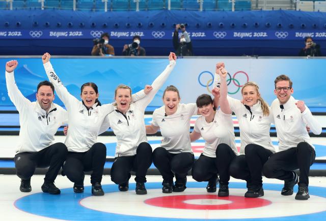 Beijing Winter Olympics: Team GB's women's curling team arrive home after  winning gold medals at the games, UK News