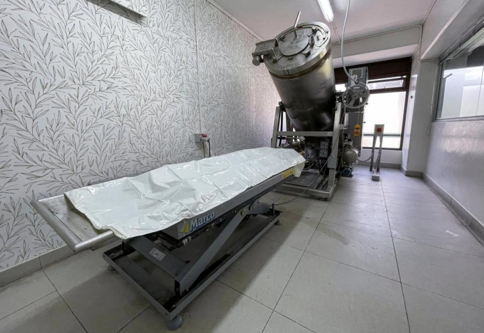 <div class="inline-image__caption"><p>A mortuary trolley is placed next to the Aquadome machine, a stainless-steel chamber used for aquamation, at the AVBOB Maitland Funeral Parlour in Cape Town, South Africa, January 11, 2022. </p></div> <div class="inline-image__credit">Reuters/Shafiek Tassiem</div>