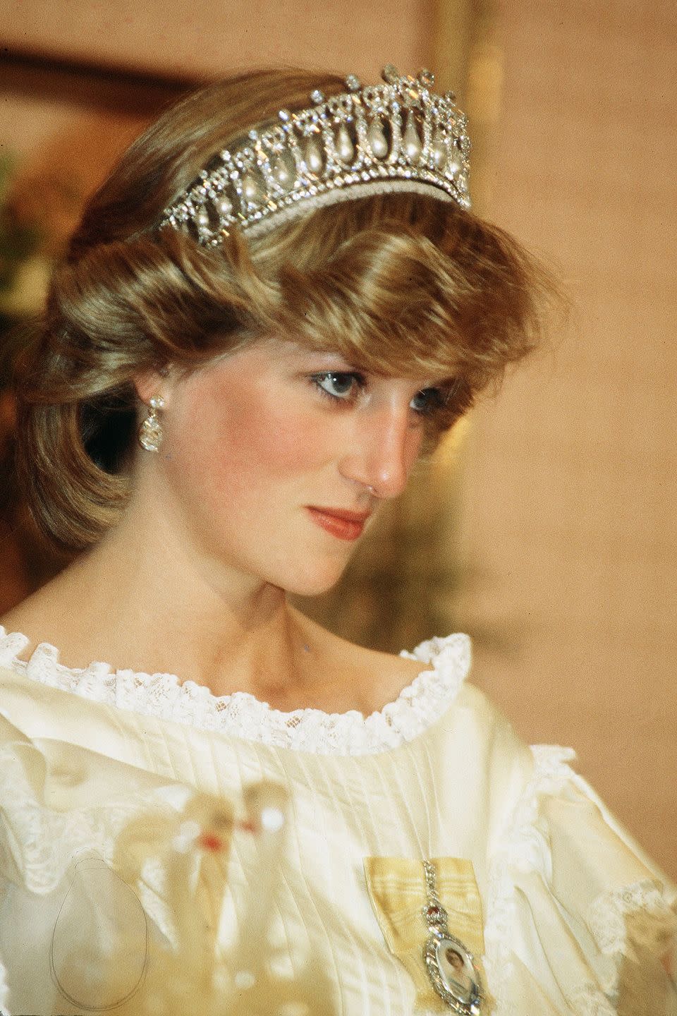 <p>Also known as Queen Mary's Lover's Knot tiara, this diamond and pearl headpiece was commissioned by Queen Mary in 1913 when she had asked British jeweler Garrard to replicate a tiara owned by her grandmother, Princess Augusta of Hesse-Kassel. It was inherited by the Queen, who gave it to Princess Diana when she married Prince Charles, but it was returned to the Queen after the couple divorced in 1996. Today it is owned by the Queen and remains a favorite with the Duchess of Cambridge, who borrows it for special occasions.</p>