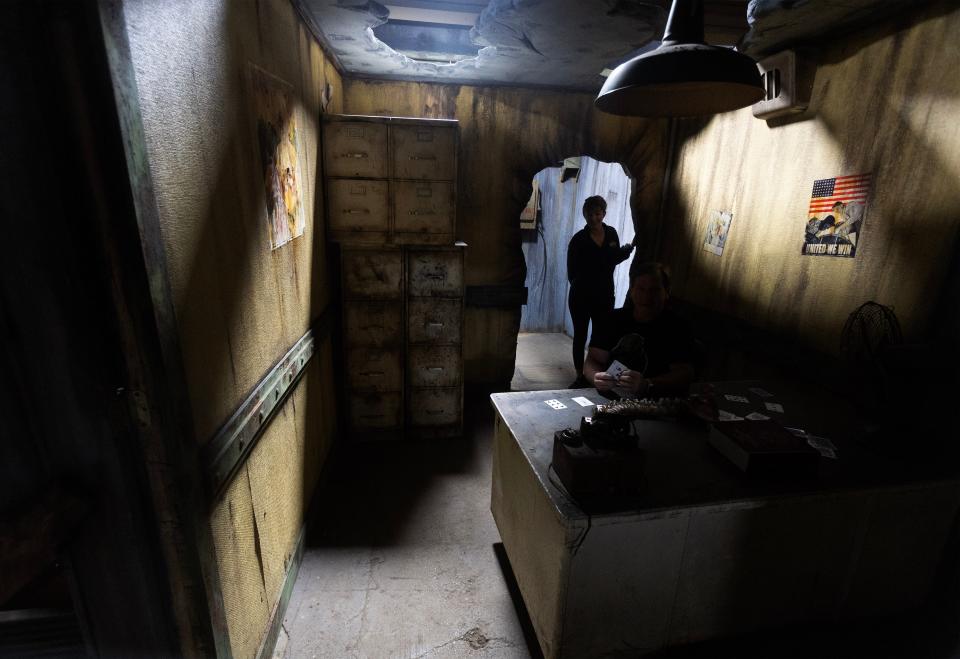 Kim Shapiro, bar manager at Factory of Terror in Canton, stands in the bunker, an area of the Industrial Nightmare haunted attraction.