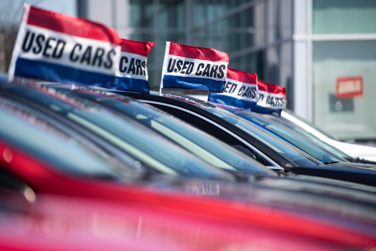 Used vehicles for sale are seen at a dealership in this file photo from April 2021. (Justin Tang/The Canadian Press - image credit)