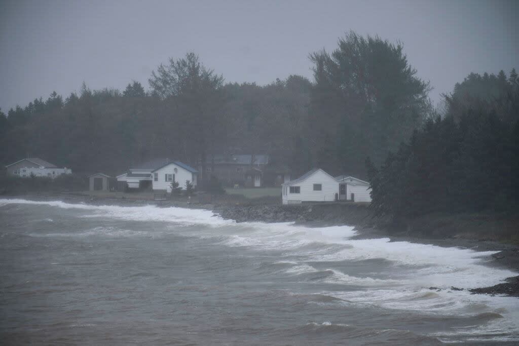 Wind and rain from post-tropical storm Fiona hits the shoreline of the Bras d'Or Lake in Irish Cove, N.S. on Sept. 24, 2022. The widespread damage, which particularly affected coastal communities, was cited in hundreds of public submissions about the Coastal Protection Act. (Drew Angerer/Getty Images - image credit)