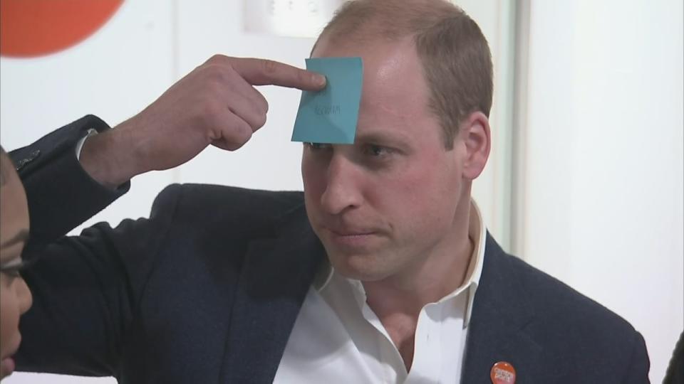 Prince William demonstrates how to play 'Guess who?'