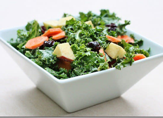 <strong>Get the <a href="http://www.choosingraw.com/seasons-best-kale-salad-with-carrots-apples-raisins-and-creamy-curry-dressing/">Kale Salad with Carrots and Creamy Curry Dressing Recipe</a> by Choosing Raw</strong>