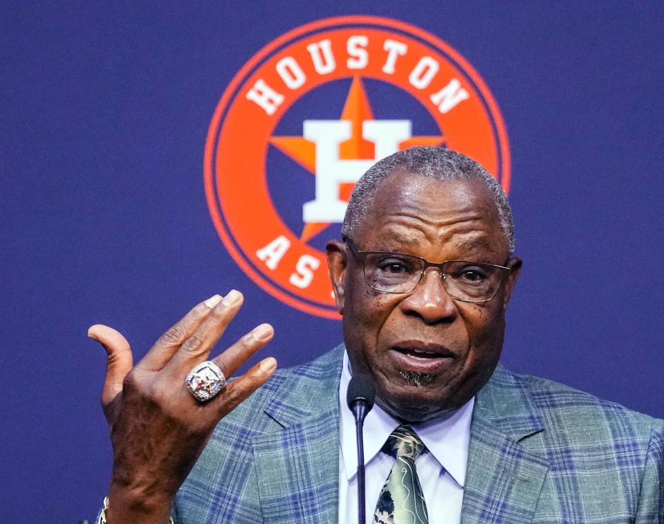 Houston Astros manager Dusty Baker Jr. holds up his Houston Astros World Series ring as he answers questions during a baseball press conference announcing his retirement, Thursday, Oct. 26, 2023, at Minute Maid Park in Houston. (Karen Warren/Houston Chronicle via AP)