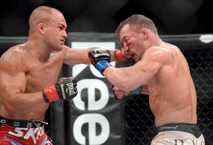 Eddie Alvarez (L) trades shots with Michael Chandler during their second fight. (USA Today)