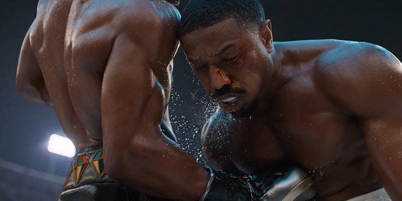 Jonathan Majors punching Michael B. Jordan in Creed III. 