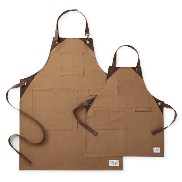 <p><a href="https://go.redirectingat.com?id=74968X1596630&url=https%3A%2F%2Fwww.williams-sonoma.com%2Fproducts%2Fgrilling-apron-bundle&sref=https%3A%2F%2Fwww.countryliving.com%2Fshopping%2Fgifts%2Fg39880311%2Fgifts-for-dad-from-son%2F" rel="nofollow noopener" target="_blank" data-ylk="slk:Shop Now;elm:context_link;itc:0;sec:content-canvas" class="link ">Shop Now</a></p><p>Coordinating Grilling Aprons</p><p>$24.95</p><p>williams-sonoma.com</p>