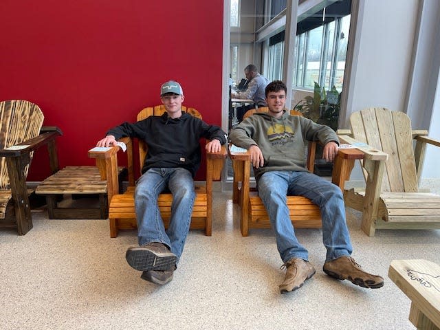 West Branch High School junior James Mincks, left, took first place, and junior Mitchell Hofmann was the runner-up in the recent Builders Associations of Eastern Ohio and Western Pennsylvania's Adirondack Chair Competition.