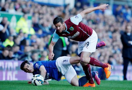 Football - Everton v Burnley - Barclays Premier League - Goodison Park - 18/4/15 Burnley's Lukas Jutkiewicz in action with Everton's Leighton Baines Reuters / Andrew Yates Livepic