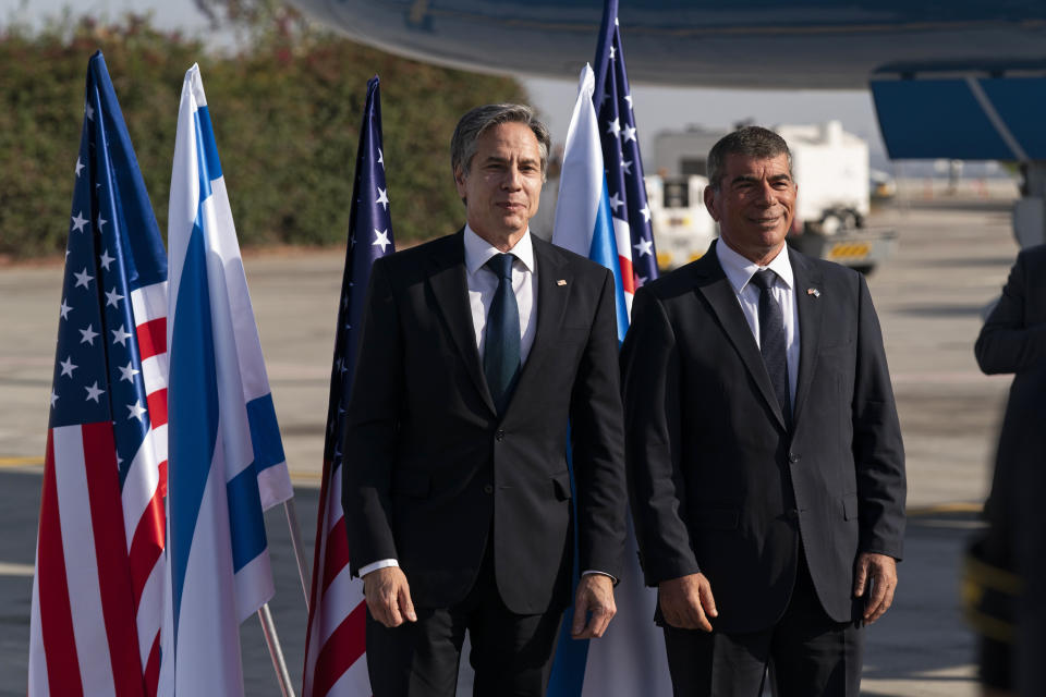 Secretary of State Antony Blinken, left, stands with Israeli Foreign Minister Gabi Ashkenazi, upon arrival at Tel Aviv Ben Gurion Airport, Tuesday, May 25, 2021, in Tel Aviv, Israel. Blinken has arrived in Israel at the start of a Middle East tour aimed at shoring up the Gaza cease-fire. (AP Photo/Alex Brandon, Pool)