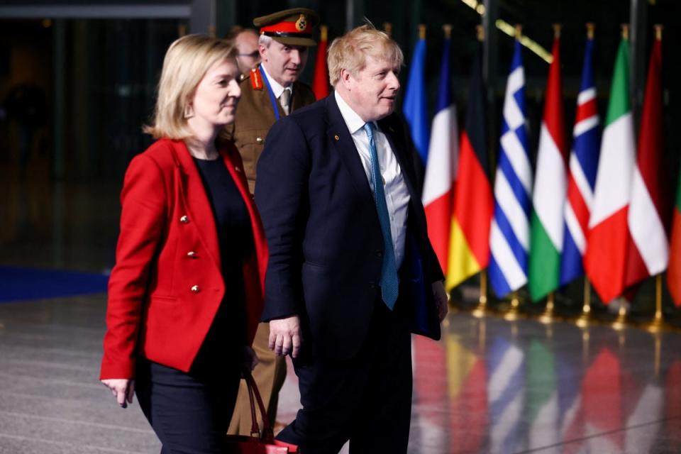 Liz Truss with outgoing prime minister Boris Johnson (Henry Nicholls/PA) (PA Wire)