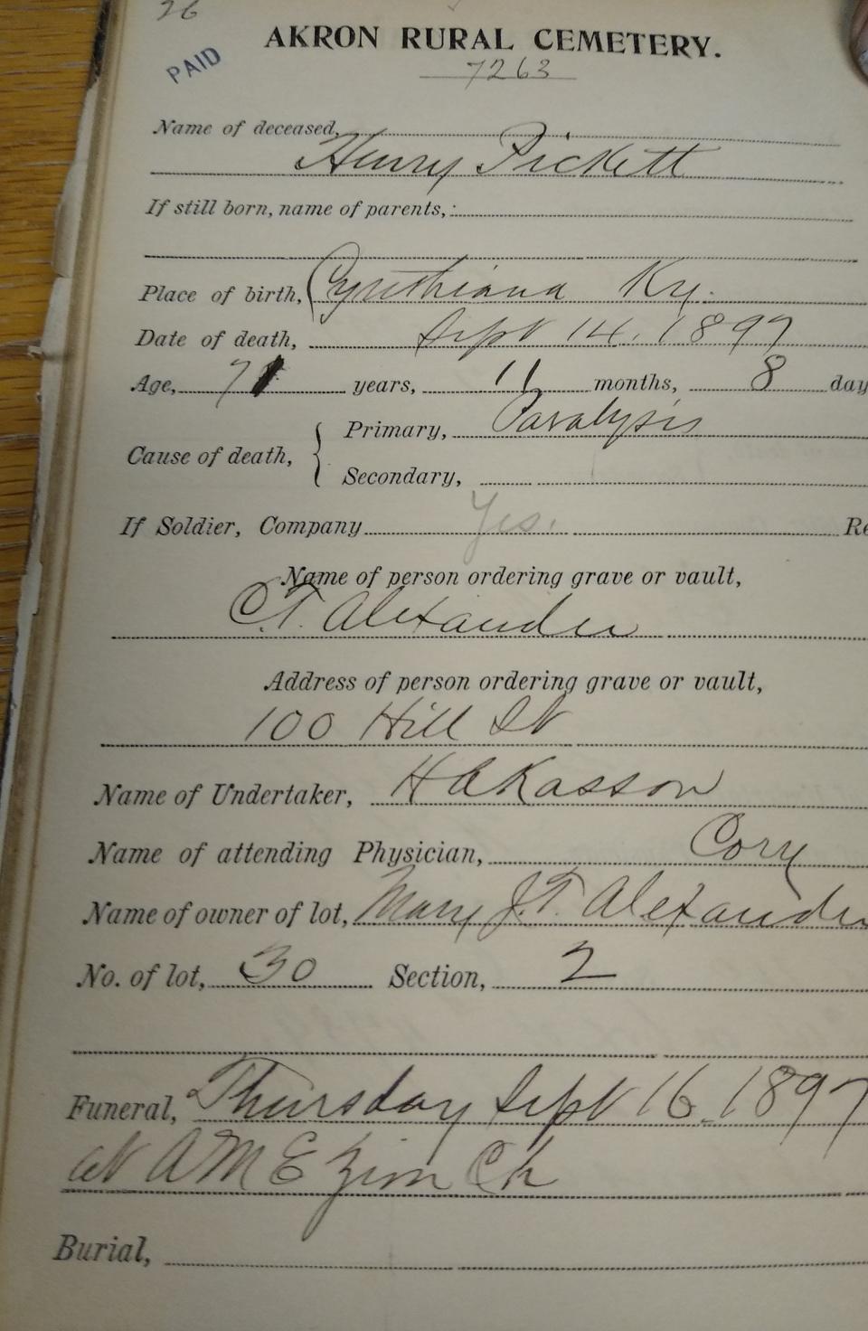 Akron inventor Henry Pickett’s 1897 death is recorded in a book at Glendale Cemetery.