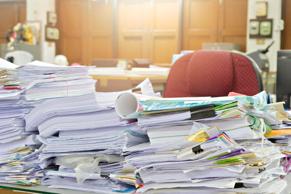 Close up of business documents stack on desk , report papers stack