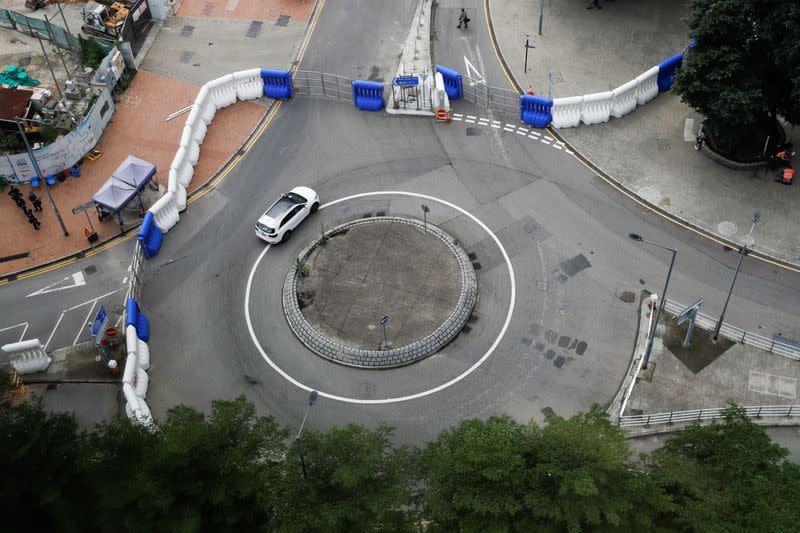 A barricade is seen near the Legislative Council Complex as a second reading of a controversial national anthem law takes place in Hong Kong