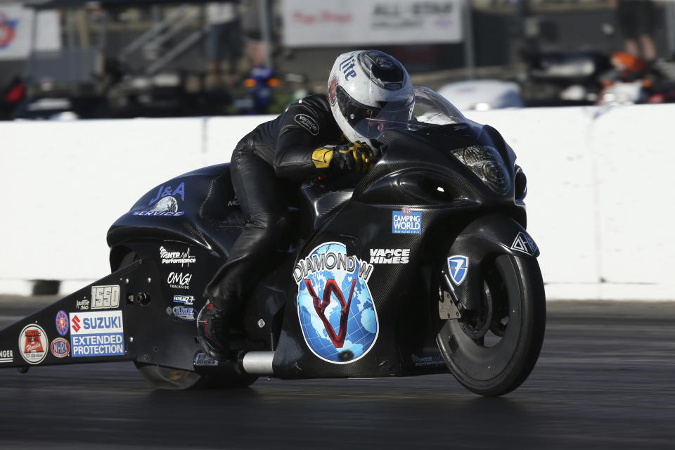 In this photo provided by the NHRA, Joey Gladstone drives in Pro Stock Motorcycle qualifying Friday, Aug. 12, 2022, at Heartland Motorsports Park for the Menards NHRA Nationals drag races in Topeka, Kan. (Bob Szelag/NHRA via AP)