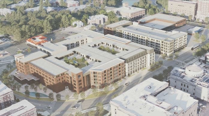 Looking southeast, this photo rendering shows plans for the new $102 million Madison Lifestyle District that will replace two parking lots south of Memorial Hospital with 240 apartment units, a 100-room hotel and 925 enclosed parking spaces in downtown South Bend.