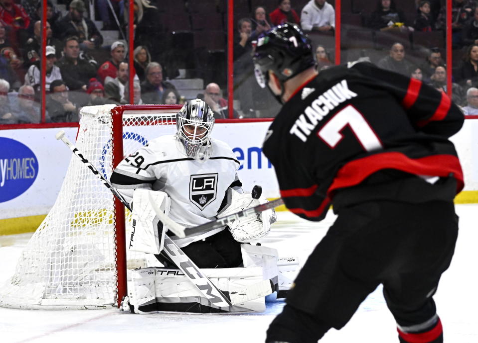 Los Angeles Kings goaltender Pheonix Copley watches the puck on a shot by Ottawa Senators left wing Brady Tkachuk (7) during the second period of an NHL hockey game, Tuesday, Dec. 6, 2022, in Ottawa, Ontario. (Justin Tang/The Canadian Press via AP)