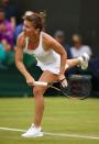 <p>Simona Halep of Romania serves during the Ladies Singles second round match against Francesca Schiavone of Italy on day four of the Wimbledon Lawn Tennis Championships at the All England Lawn Tennis and Croquet Club on June 30, 2016 in London, England. (Photo by Clive Brunskill/Getty Images)</p>