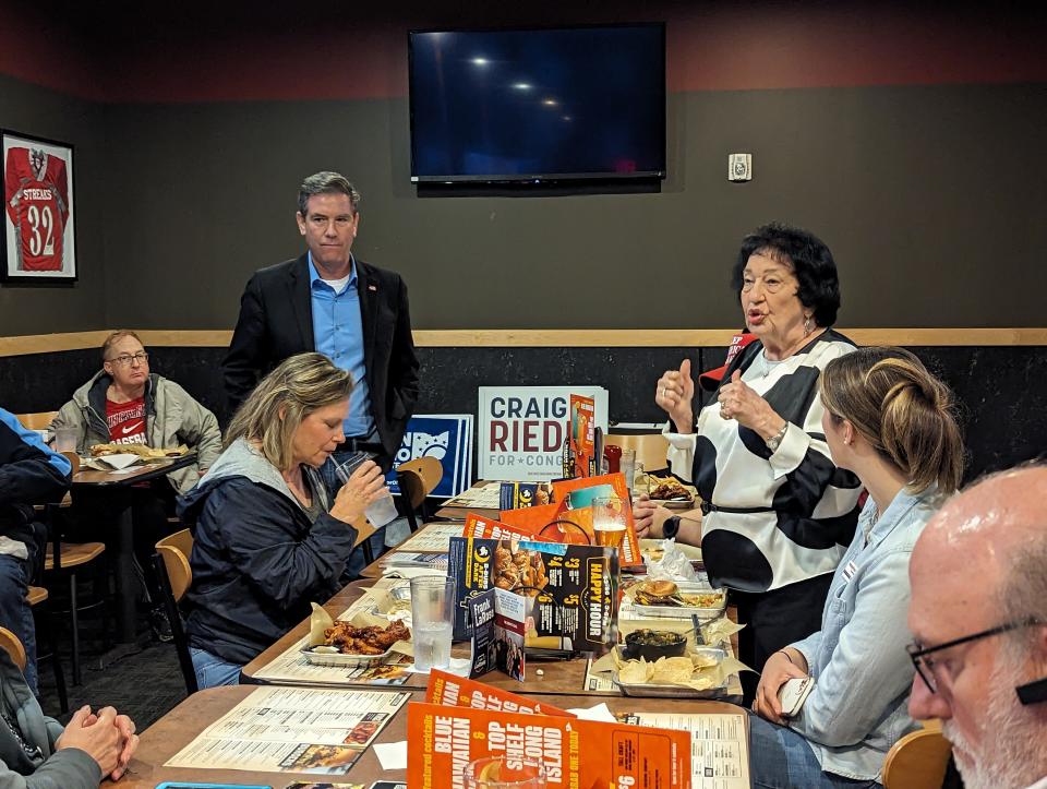 Jean Turner, Sandusky County Republican Women’s Club, right, speaks to Republican Congressional candidate former State Rep. Craig Riedel, at the Sandusky County Republican Party meeting. She believes some may delay their early voting until candidates make local visits.