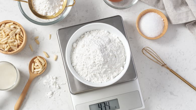 weighing a bowl of flour