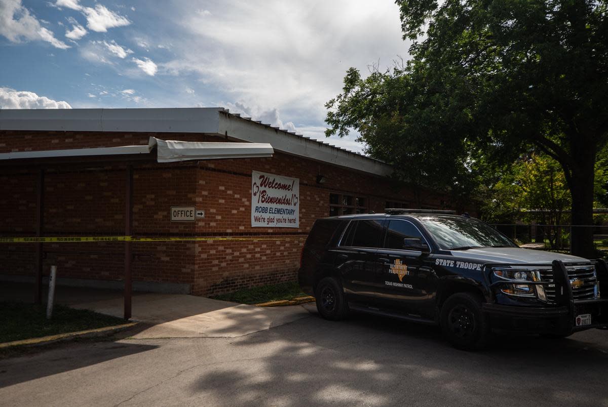 Texas State Trooper vehicles are stationed outside the Robb Elementary School in Uvalde on June 2, 2022.