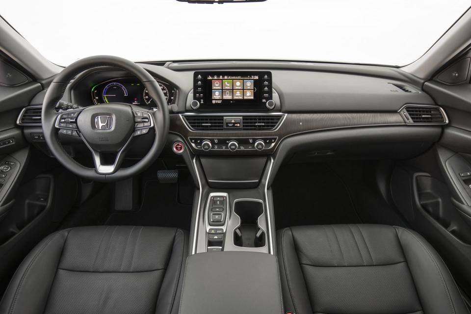 <p>We also like that the Accord Hybrid is nearly indistinguishable from the standard models on the outside, without quirky "Look-I’m-green!" styling. And on the inside, the Honda's spacious interior offers plenty of room for adults along with high quality materials and an attractive design.</p>