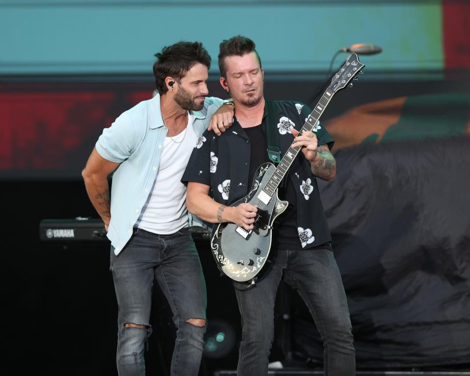 Country music band Parmalee with brothers Matt Thomas on lead vocals and guitar, Scott Thomas on drums, their cousin Barry Knox on bass and Josh McSwain on guitar play before the Tyler Hubbard show at the Iowa State Fair on East Side Night, Aug. 11, 2023.