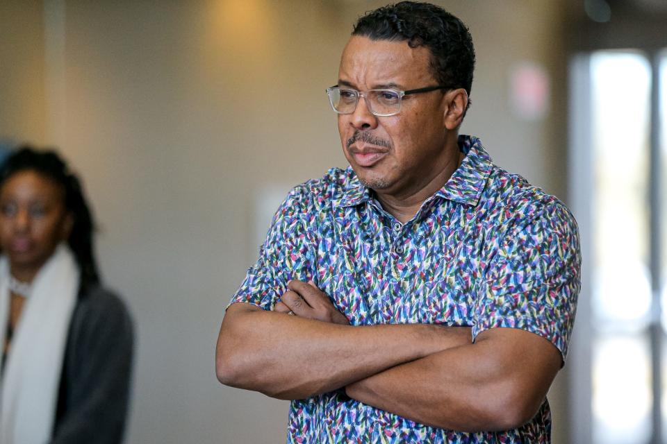 The Rev. Derrick Scobey talks with guests during the "Realizing the Dream," a tour of the African American exhibit at the Oklahoma History Center in Oklahoma City on Saturday, Feb. 11, 2023.