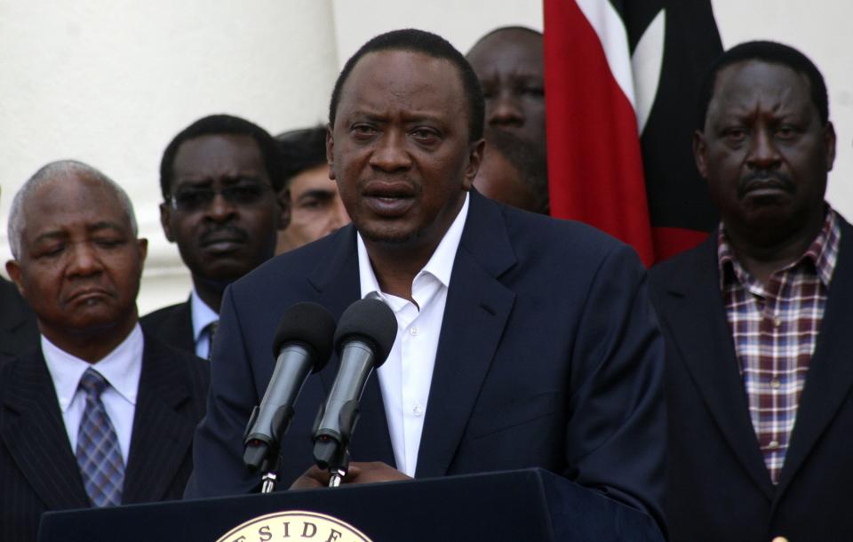 Kenya's President Uhuru Kenyatta addresses the nation on the Westgate shopping mall attack in the capital Nairobi September 22, 2013. Islamist militants were holed up with hostages on Sunday at the shopping mall in Nairobi, where at least 59 people have been killed in an attack by the al Shabaab group that opposes Kenya's participation in a peacekeeping mission in neighbouring Somalia. A volley of gunfire lasting about 30 seconds interrupted a stalemate of several hours, a Reuters witness said, speaking from near the Westgate shopping centre that has several Israeli-owned outlets and is frequented by expatriates and Kenyans. REUTERS/Stringer (KENYA - Tags: CIVIL UNREST POLITICS PROFILE)