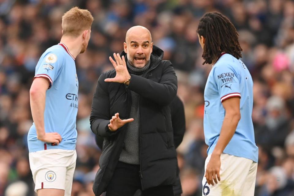 Pep Guardiola directs his players from the touchline (Getty Images)