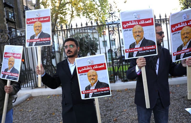 FILE PHOTO: People protest against the killing of journalist Jamal Khashoggi in Turkey outside the Saudi Arabian Embassy in London