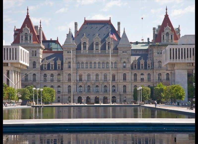 <strong>NEW YORK STATE CAPITOL</strong>  Albany, New York    <strong>Year completed: </strong>1899  <strong>Architectural style:</strong> Italian Renaissance/French Renaissance/Romanesque  <strong>FYI: </strong>The Western staircase inside New York’s capitol has been dubbed the “Million Dollar Staircase,” because it cost more than a million dollars to build—in the late-1800s, no less. The 444 steps took 14 years to complete, and more than 500 stonecutters and carvers earned $5 a day to work on the project. The staircase’s main feature is 77 carvings of faces, which include prominent Americans such as Abraham Lincoln and Susan B. Anthony, as well as images of the carvers’ friends and relatives.  <strong>Visit:</strong> Guided tours are available Monday to Friday (excluding holidays). Tour times vary; call the Office of General Services—Visitor Assistance for more information.  